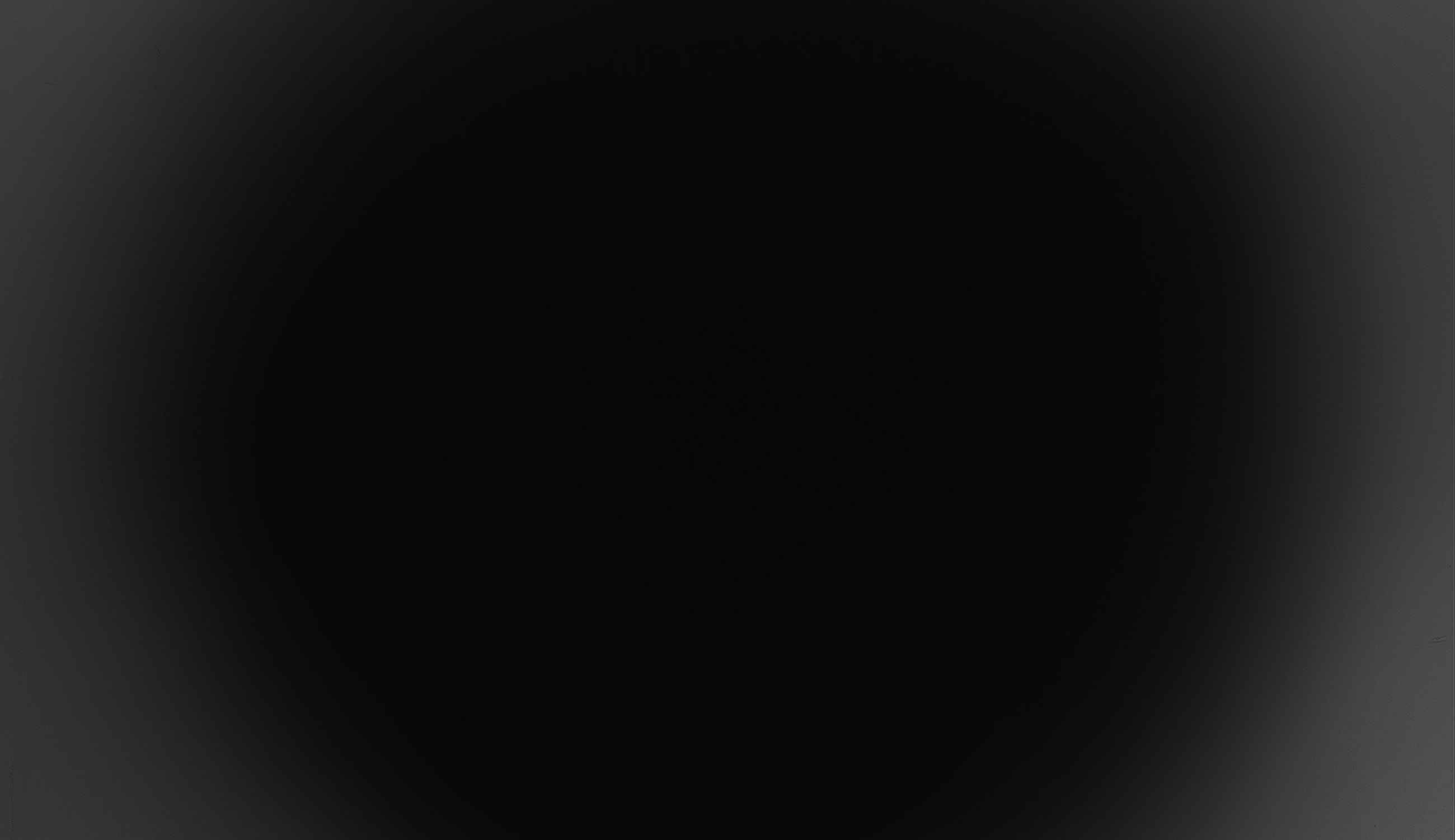 Dark image with gradient shadow effect.