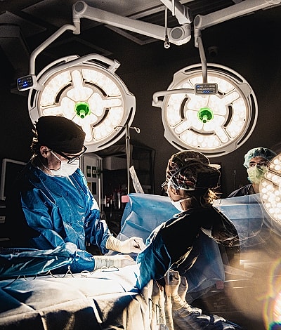 Surgical team performing an operation in hospital.