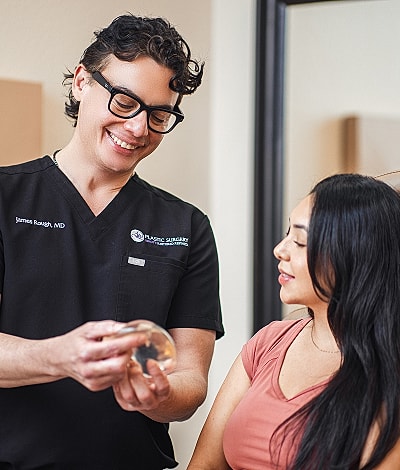 Consultation between doctor and patient about implants.