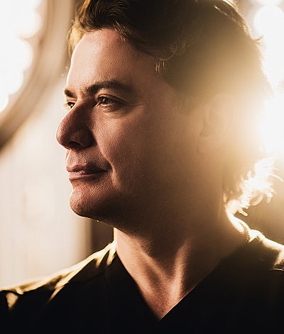 Man in profile with soft lighting around him