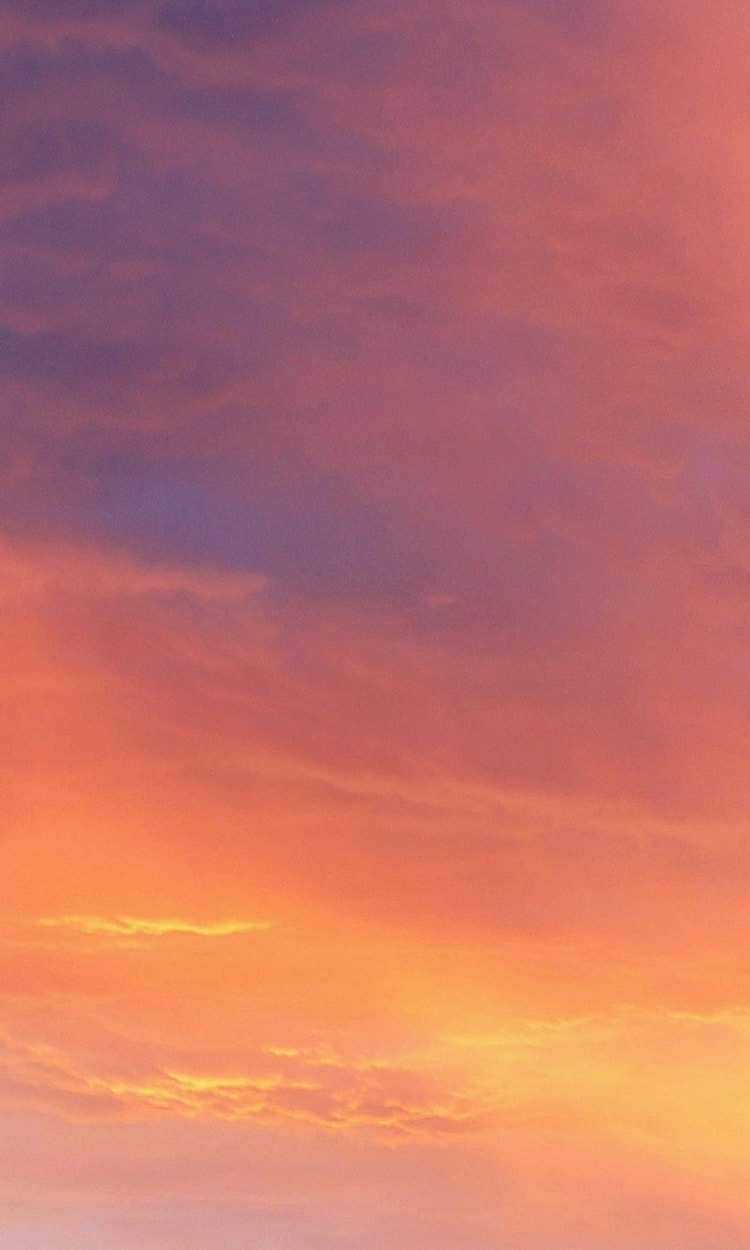 Colorful sky at sunset with clouds.