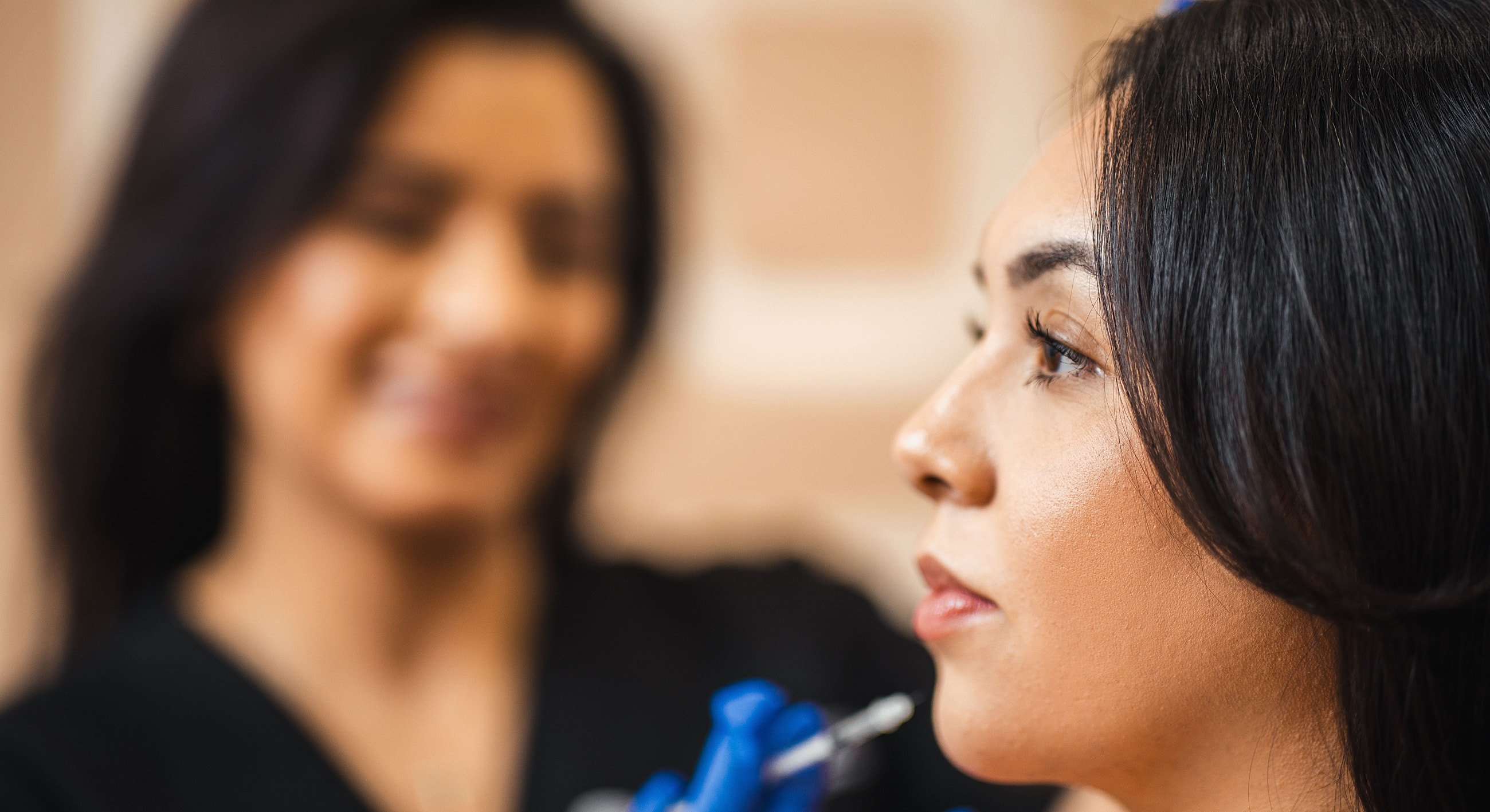 Tucson Botox model receiving cosmetic treatment in a salon.